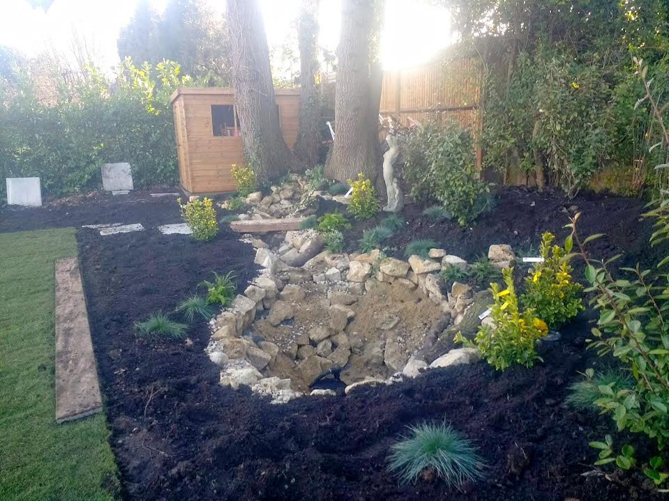 Pond garden feature under construction